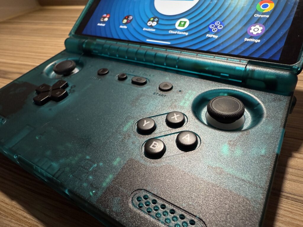 Close up of Retroid Pocket Flip 2 face buttons from the right